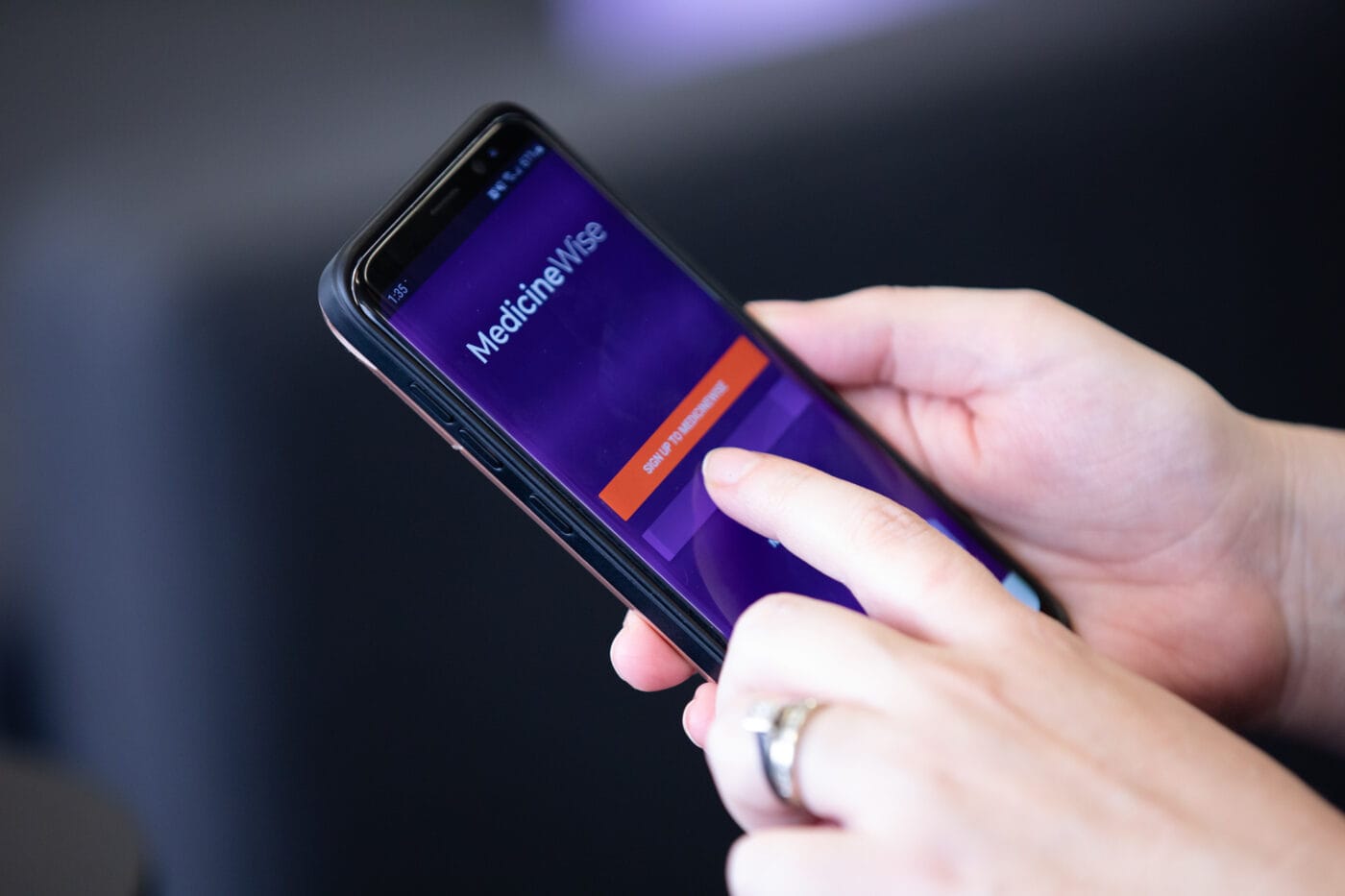 Close up of MedicineWise app on phone